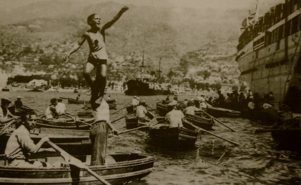 Selling rides to passengers on the to ships moored on the breakwater