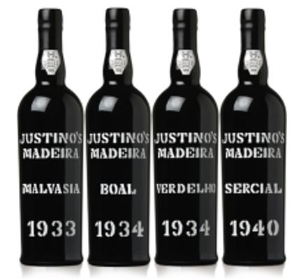 Justino's Madeira wines in their distinguished stenciled bottles dating from the 1930's and 1940's