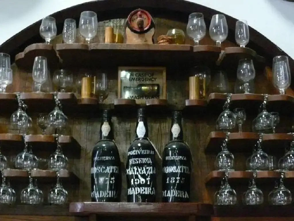 Distorted bottles of Madeira to be seen when visiting D’Oliveiras