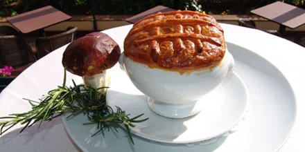 Veal consomme en croute with black truffles